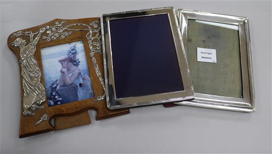 Two silver mounted photograph frames, Birmingham, 1923 and London, 2000 and a white metal mounted frame.